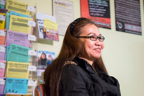 Rojana Jamjai, 47, from Ubonratchanee, Thailand, talks at the Worker's Action Center in Toronto, Ontario, Canada, about her experience working in Canada as a guest worker.
