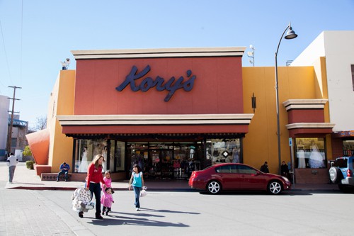 Pedestrians pass by Kory's, a clothing store in Nogales, Ariz. 