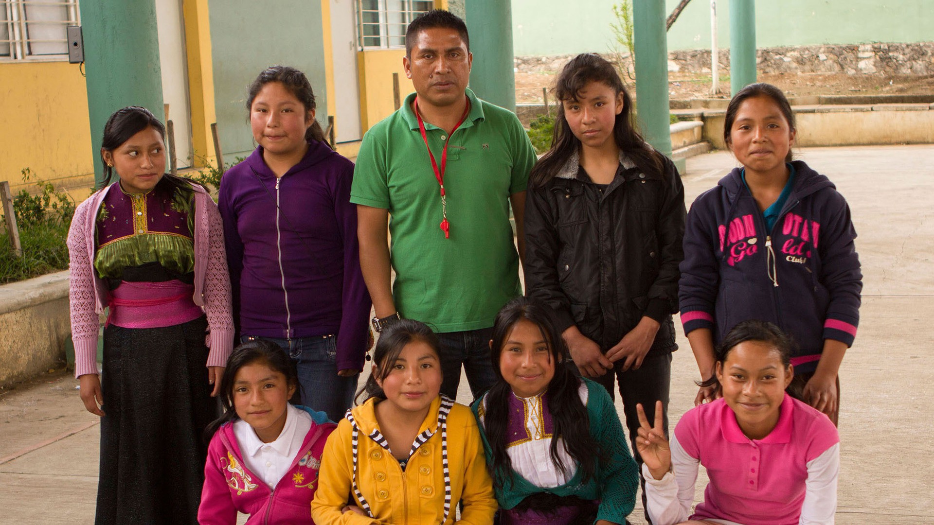 Octavio Santis and his 5th grade girls basketball team at the Benito Juárez School. (Photo by Alex Lancial.)