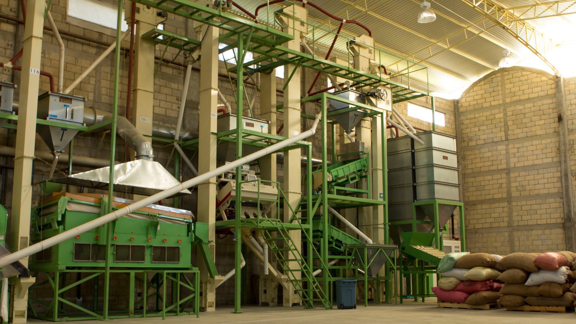 Coffee production machinery sits in the warehouse of E-Café. (Photo by Alex Lancial.)
