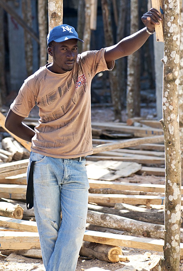 Construction worker Polimet Poleus takes a break from working on the grounds of a new apartment complex in Santo Domingo, Dominican Republic.