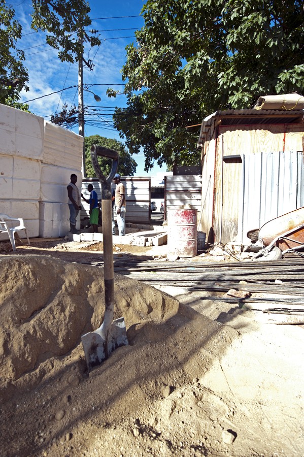 Haitian workers take a break at a construction site in Santo Domingo. The Dominican labor code mandates that 80 percent of laborers for any company must be Dominican citizens, but the law is often ignored.