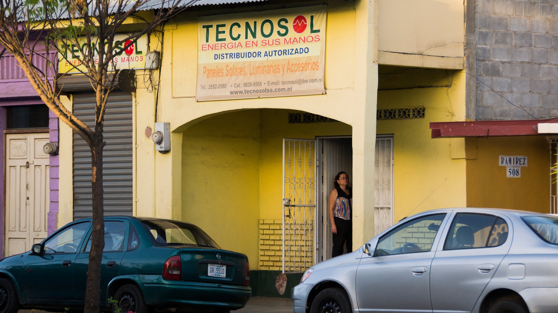 Veronica Delagneau Barquero stands in the doorway of the Tecnosol location in Granada, Nicaragua, on March 12, 2015. The privately owned company has worked to bring solar energy to rural areas and has more recently expanded to an urban market. (Danika Worthington)