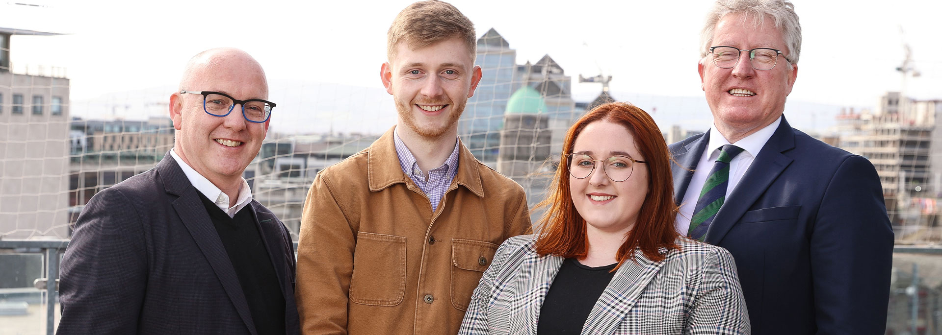 Veronica Guerin Washington Scholarship. Scholarship awardees Liam Coates and Erin Murphy with 9l-r); Prof. Kevin Rafter, DCU and Prof. Daire Keogh, President, DCU. Photo by Gerry Mooney