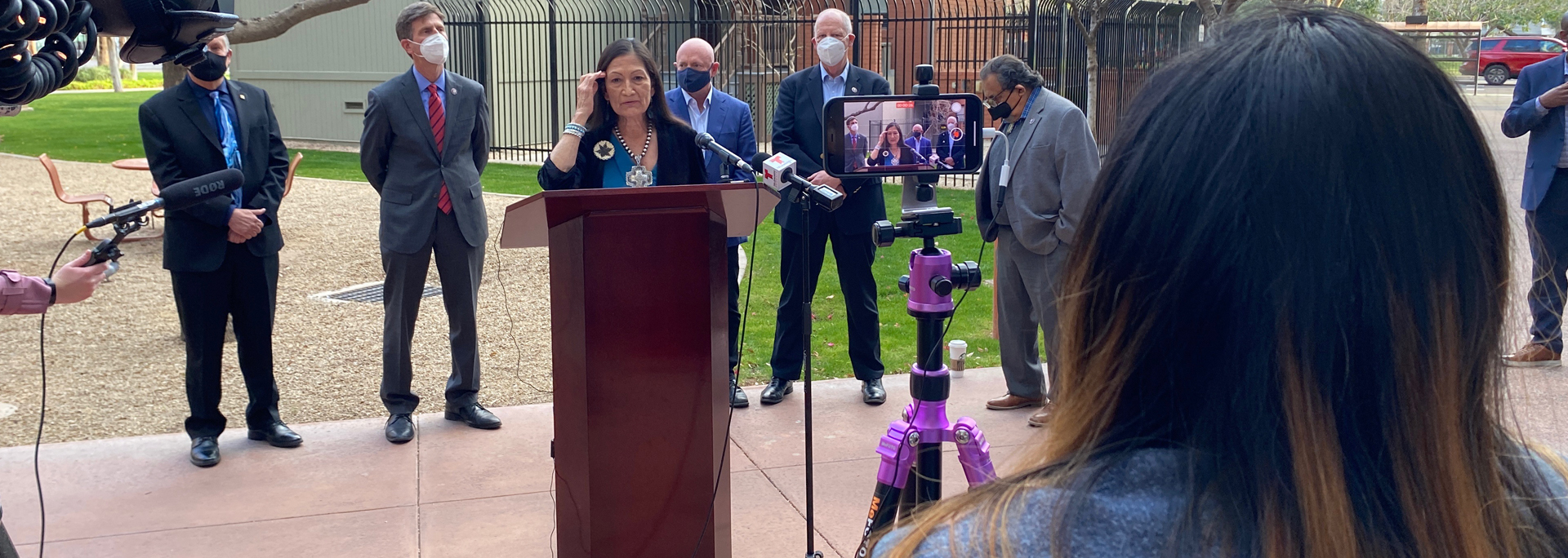 A student captures video of Indigenous leaders at a news conference