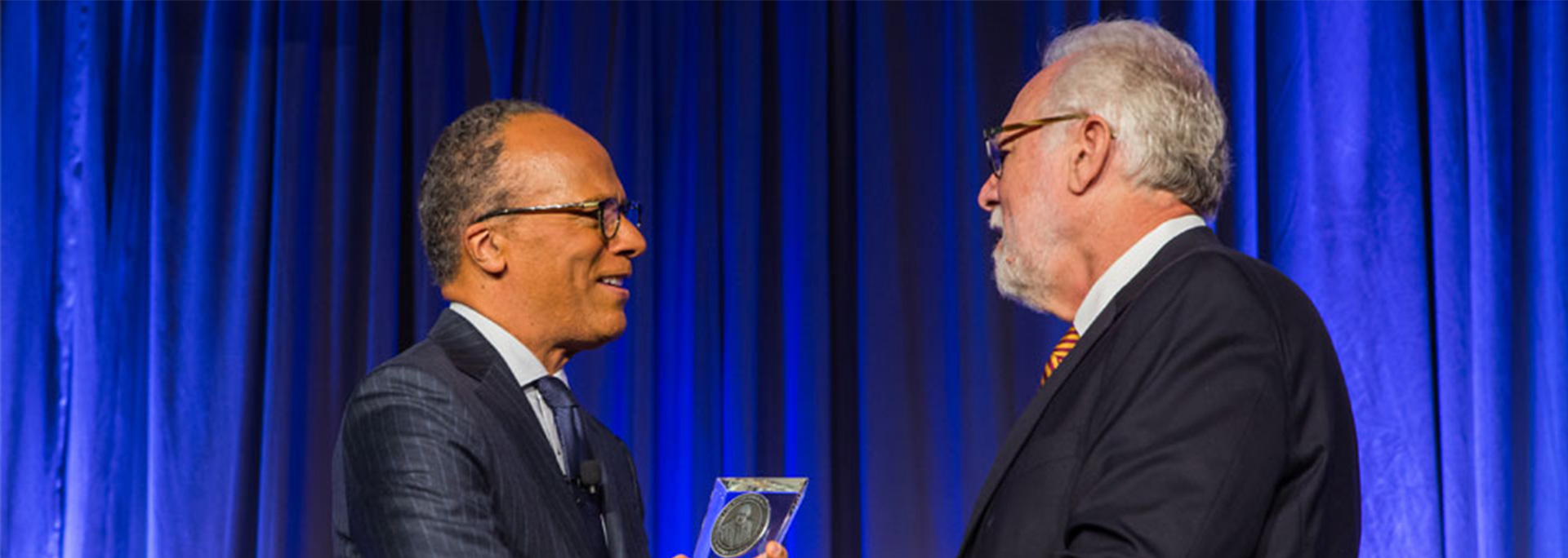 Lester Holt is presented with his Cronkite Award.