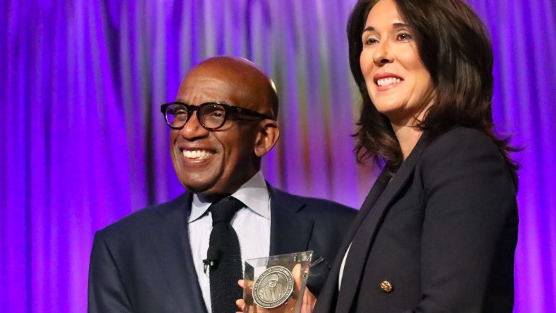 Al Roker and Provost Gonzales holding the Cronkite Award