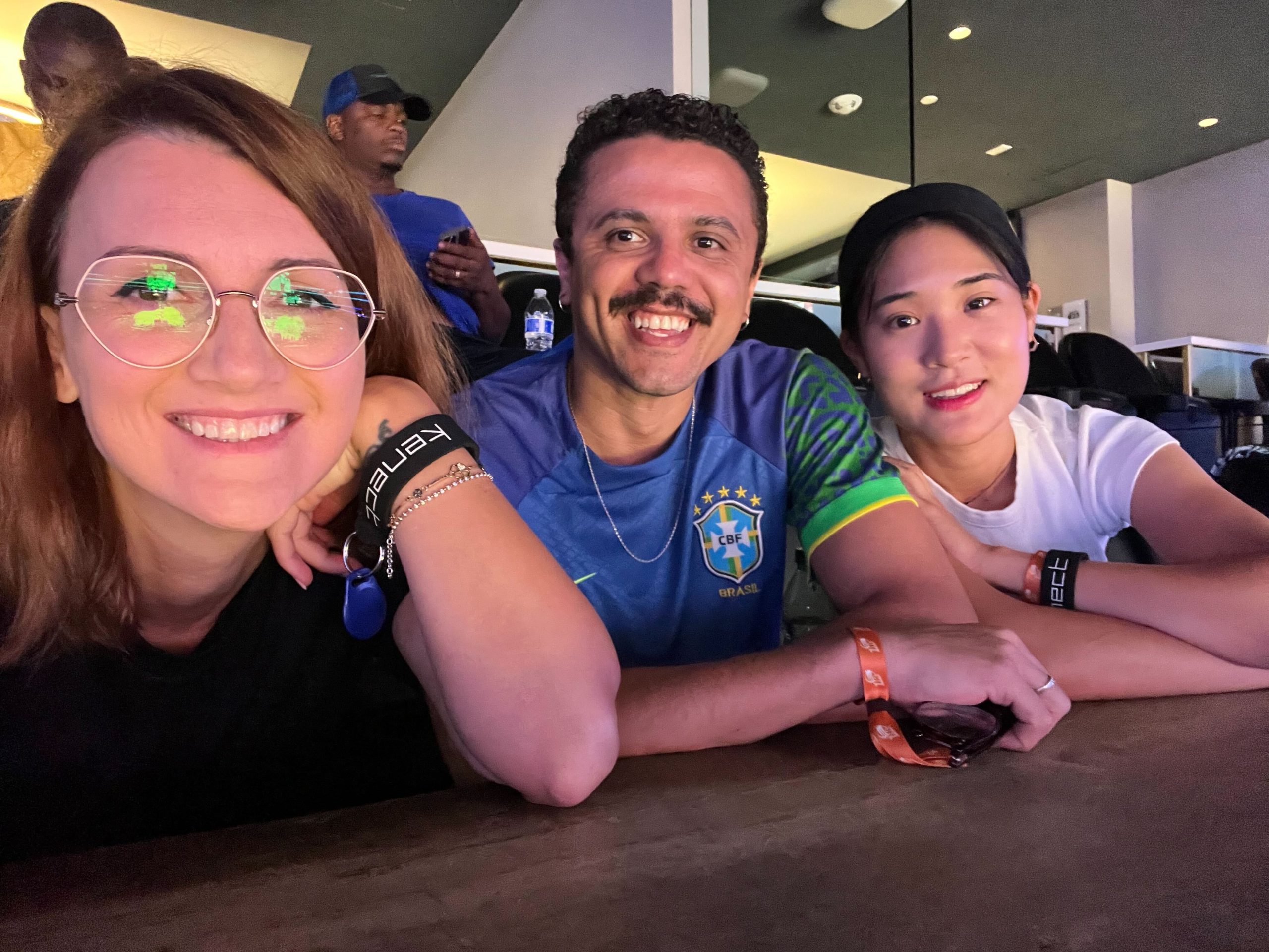 Three international Hubert H. Humphrey fellows smile at the camera.