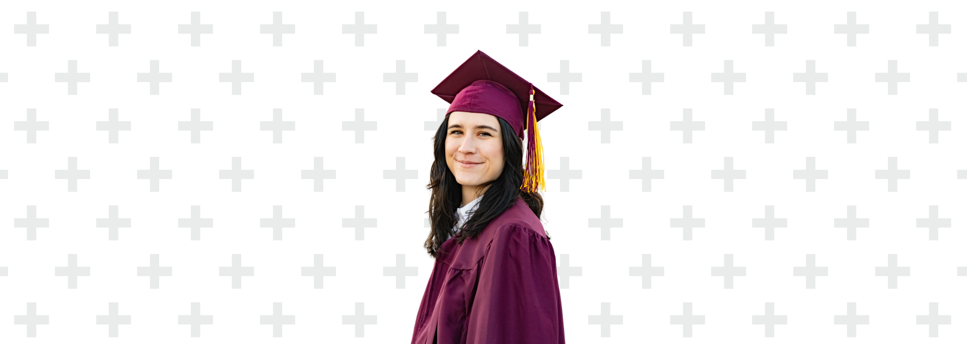 Kayla Christenson in ASU graduation regalia.