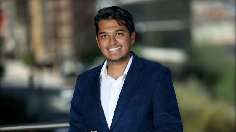 Headshot of Pratham Dalal in a blazer and white shirt.