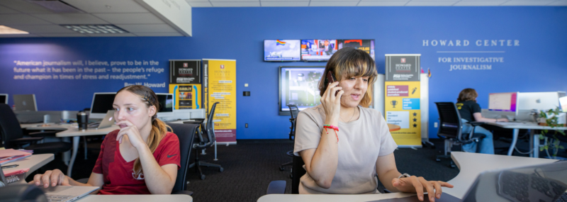 Graduate students work on a project at the Howard Center for Investigative Journalism. (Adrienne Washington and Anisa Shabir)