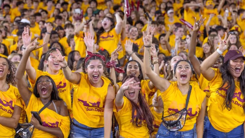 ASU students cheer in the stands at Mountain America Stadium
