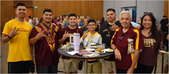 A new student and their family enjoy an ASU Family Welcome event.