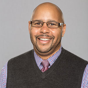 A headshot of C. Keith Harrison